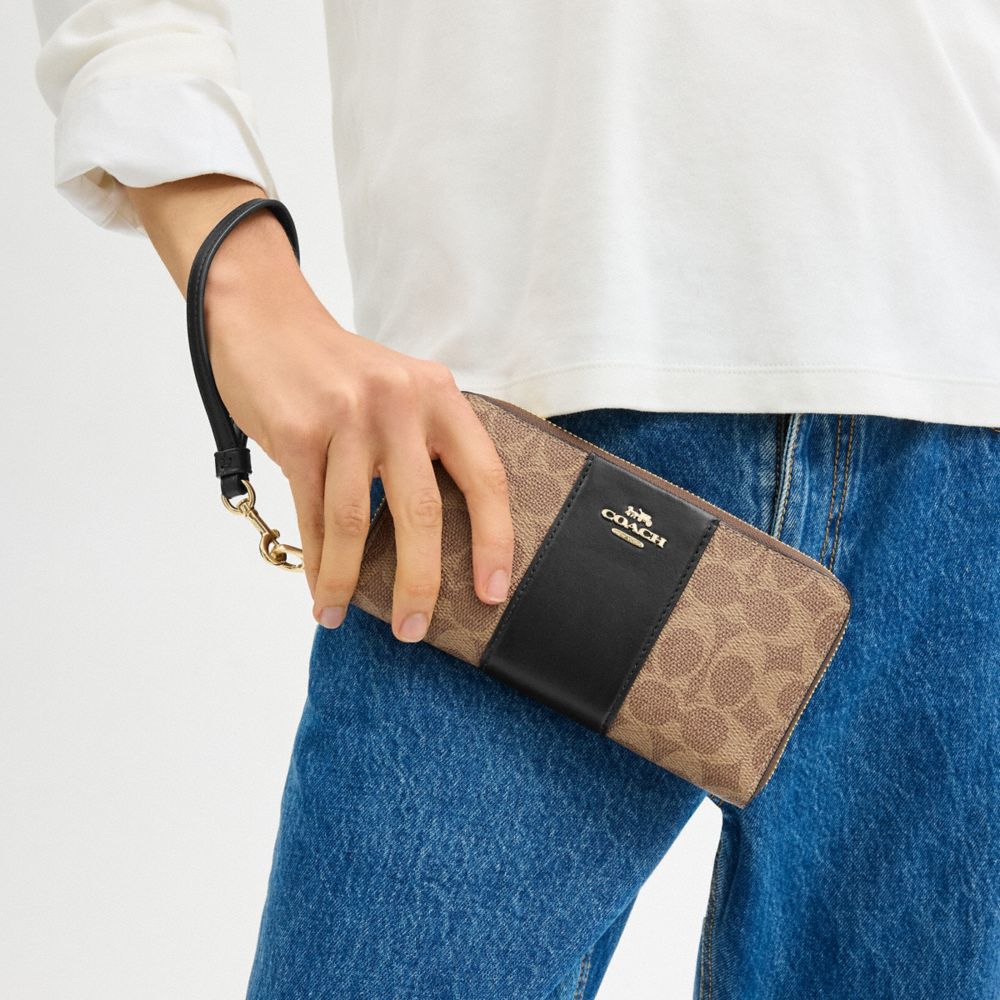 COACH LONG ZIP AROUND WALLET IN SIGNATURE CANVAS TAN/BLACK (CW947)